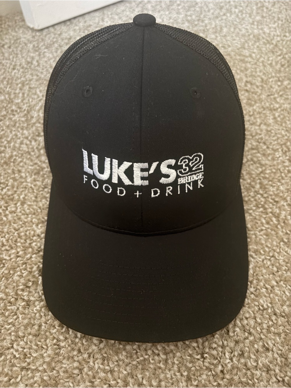 LUKE'S Food + Drink Black Logo Trucker Hat